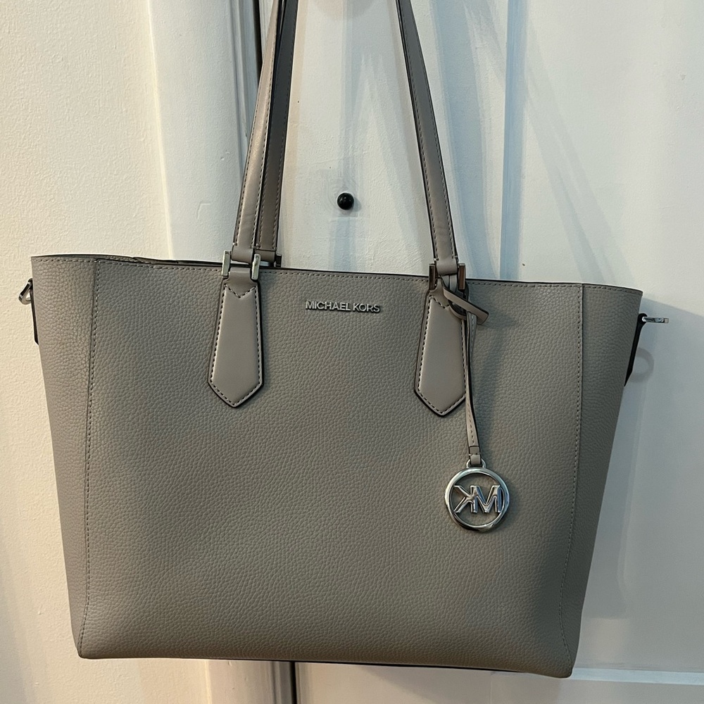 Michael Kors tote with matching white coin purse and zippered clutch